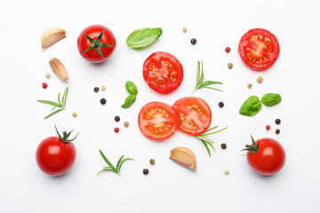 Fresh ripe tomatoes, garlic, herbs and spices on white background, flat lay