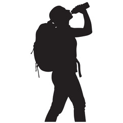 Silhouette of a Hiker with a Backpack Drinking from a Bottle