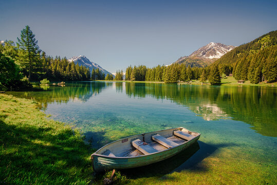 Rowing boat at the edge of Lake Arni (Arnisee), Uri, Switzerland