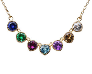 Elegant heart-shaped gemstone necklace featuring multi-colored stones on a gold chain for stylish accessories and gifts