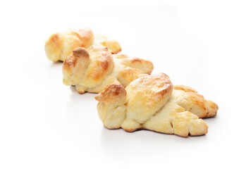 Turkey-shaped bread rolls for Thanksgiving or dinner. Cute baked yeast buns with egg wash, made from traditional Swiss butter bread recipe Zopf. Prepared for holiday meals. Selective focus.