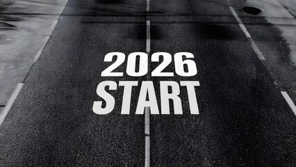 2026 start text on wet road with center line perspective