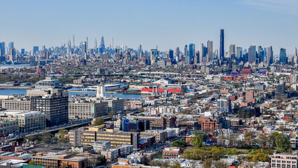 Naklejka premium Aerial landscape of Manhattan skyline from Sunset Park Borough Park Brooklyn in New York City NY