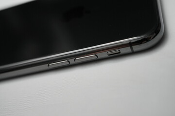 Apple iPhone XS in Space Gray on White Background