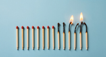 Line of Matches, Some Lit, Some Burnt fire burning