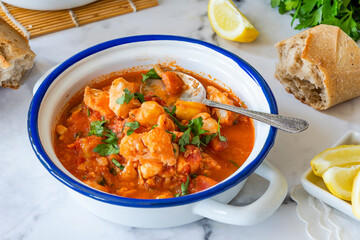 Fish stew made of cod, salmon, smoked haddock and prawns