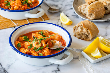 Fish stew made of cod, salmon, smoked haddock and prawns
