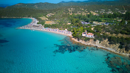 Naklejka premium Crystal Clear Sea and Rocky Shoreline, Sardinia Drone Seascape