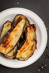 Baked eggplant grilled vegetables fresh natural product tasty snack delicious gourmet food background on the table rustic top view copy space keto and paleo diet vegan and vegan food
