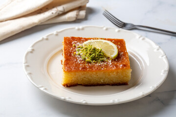 Revani - sweet semolina cake with pistachio, traditional turkish dessert