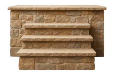 A rustic stone porch with a natural finish and broad steps, ideal for a country home.