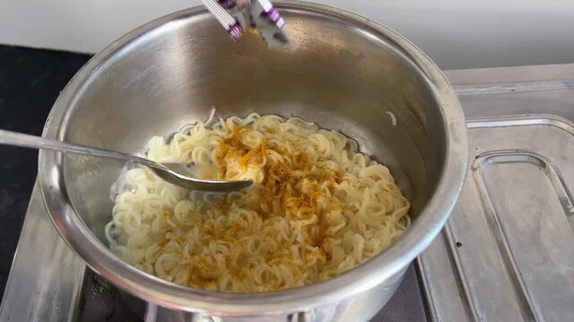 Adding Maggi Masala into Noodles | Mixing Spice Powder While Cooking Instant Maggi