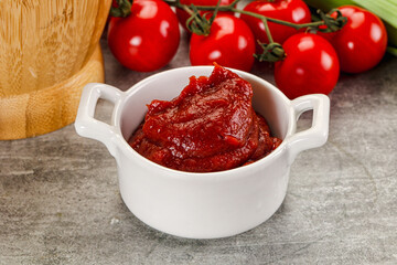 Red tomato paste in the bowl