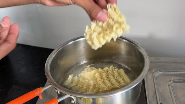 Adding Maggi Noodles into Boiling Water | Cooking Instant Noodles in Hot Pan on Gas Stove