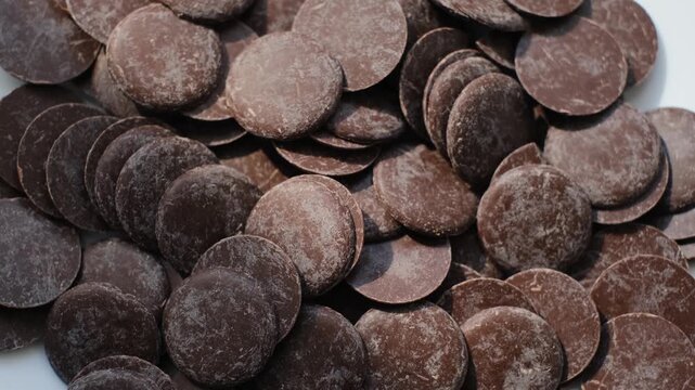 Close-up of round pieces of dark chocolate