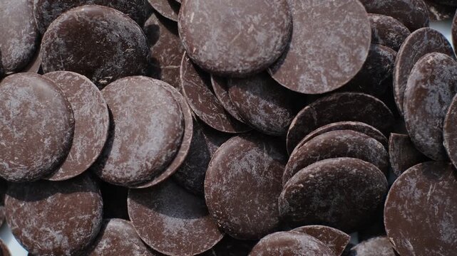Close-up of round pieces of dark chocolate