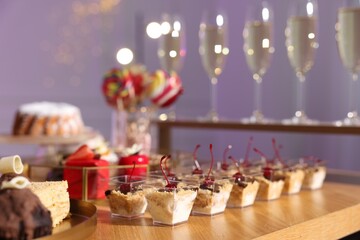 Buffet menu. Delicious desserts and drinks on table, selective focus