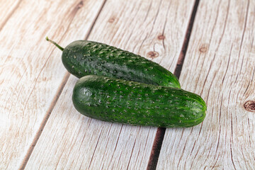 Ripe green raw two cucumbers