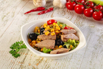 Dietary salad with canned tuna and corn