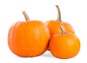 Three whole ripe pumpkins isolated on white
