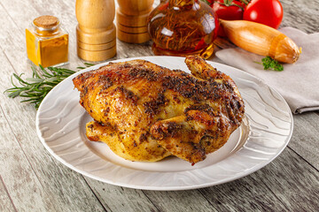 Baked in oven whole chicken with spices