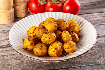 Baked small baby potato with herbs