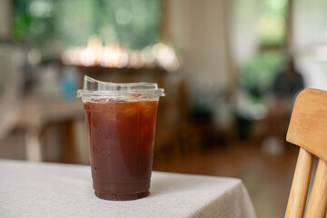 Coffee in a plastic cup to take home
