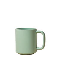 Obraz premium Ceramic mug in soft green color placed on a plain background, suitable for coffee or tea lovers seeking a minimalistic design for their kitchen