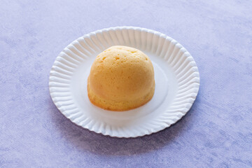 Modern bakery with many ingredients such as wheat flour, sugar, eggs, grains, fruit, butter, milk.