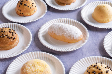 Modern bakery with many ingredients such as wheat flour, sugar, eggs, grains, fruit, butter, milk.