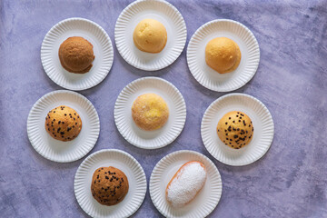 Modern bakery with many ingredients such as wheat flour, sugar, eggs, grains, fruit, butter, milk.