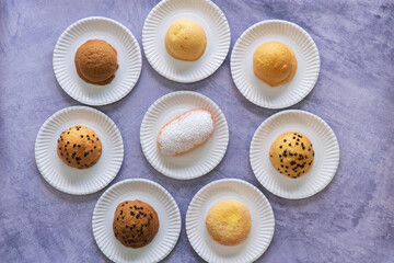 Modern bakery with many ingredients such as wheat flour, sugar, eggs, grains, fruit, butter, milk.