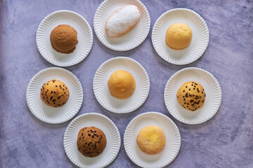 Modern bakery with many ingredients such as wheat flour, sugar, eggs, grains, fruit, butter, milk.