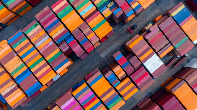 Fototapeta Aerial view global business logistic transportation container cargo international terminal port, Container cargo industrial import export port by container cargo ship, Sea freight shipping container.