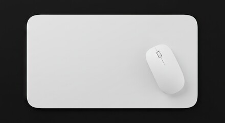 A white wireless mouse on a white mousepad set against a dark background