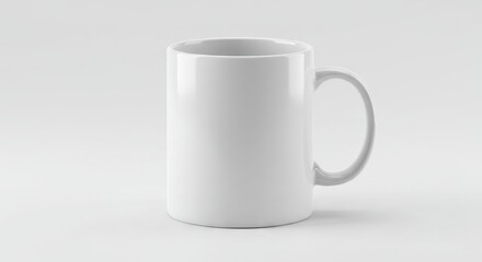 Obraz premium A white ceramic mug stands on a light gray surface handle to the right with soft lighting