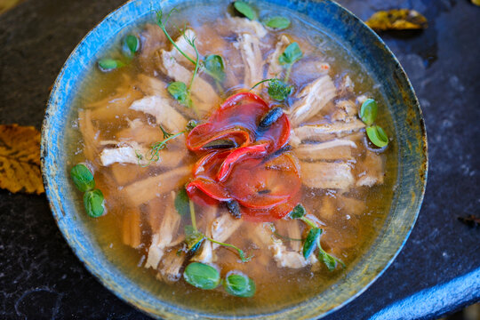 Home made aspic, jellied chicken meat with herbs and carrots. Traditional Russian dish holodets. Served with bread and mustard orand horseradish. High quality photo