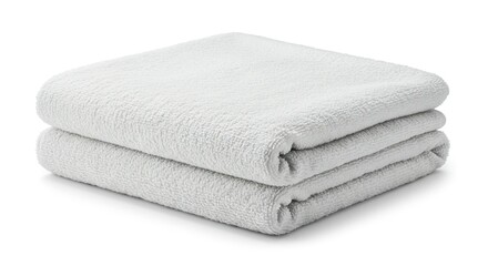 Two neatly folded white towels are stacked on a white surface casting a slight shadow