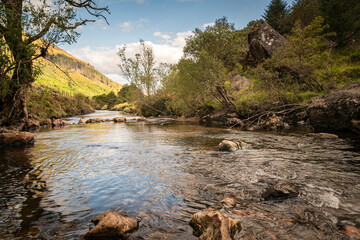 A pastoral, autumn HDR image of the River Massan flowing through Glen Massan on its way to Holy Loch, Argyll and Bute, Scotland.