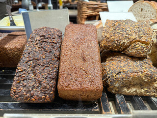 Rustic rye loaf on bakery counter display
