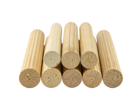 Close-up of wooden dowels arranged, showing end grains and ribbed cylindrical sides