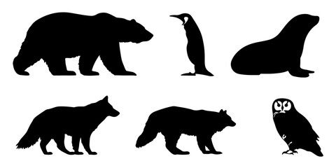 Collection of arctic and antarctic animal silhouettes including a bear penguin seal fox wolf and owl silhouette