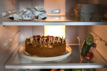 cheesecake birthday cake with raspberries in fridge with candles Happy Birthady