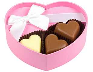 Pink heart-shaped gift box with a white ribbon, holding heart-shaped chocolates