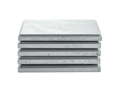 Stack of rectangular, textured grey panels, showing the layered side, with black background