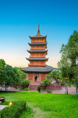 Bai Dinh Pagoda at twilight, Ninh Binh, the biggest buddhist temple complex in Vietnam, tourist religious travel destination. Scenic karst landscape.