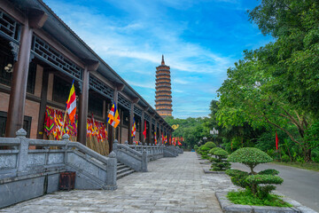 Bai Dinh Pagoda at twilight, Ninh Binh, the biggest buddhist temple complex in Vietnam, tourist religious travel destination. Scenic karst landscape.