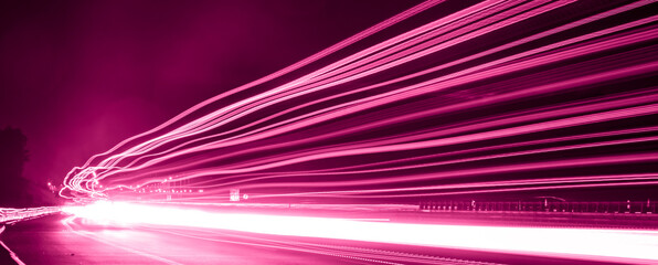 violet car lights at night. long exposure