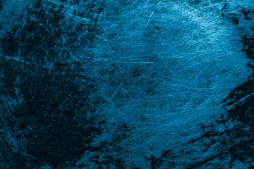 blue old aluminum sheet with burnt marks from the pan