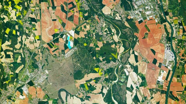 Top shot on fertile land and soil, agricultural district. Camera is moving forward. Animation based on image by NASA